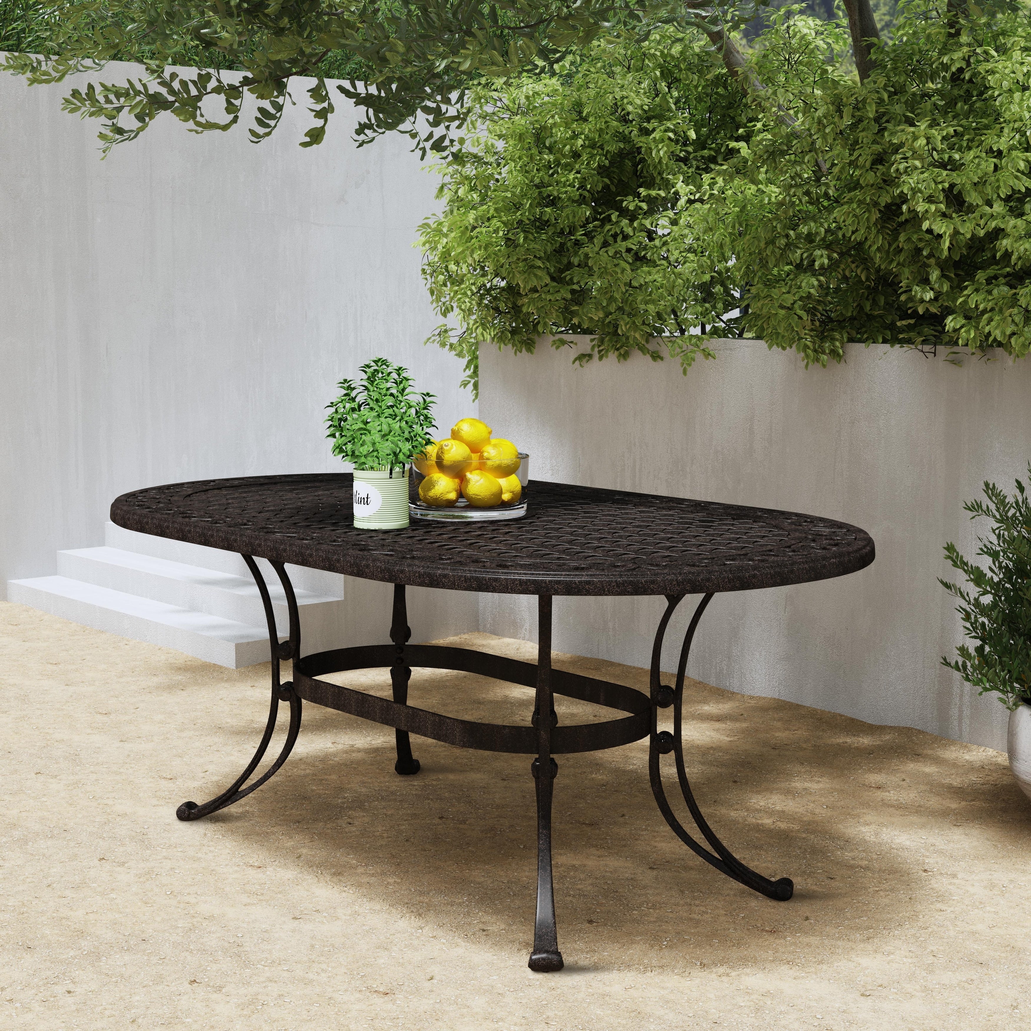 Ensemble de salle à manger d'extérieur Sanibel en fonte d'aluminium, 7 pièces, avec table ovale et 6 chaises pivotantes, par Homestyles