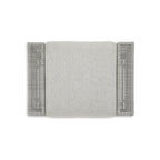 Ottoman d'extérieur gris Signature Design by Ashley Seton Creek avec coussin - 35,13 L x 24,5 P x 19 H