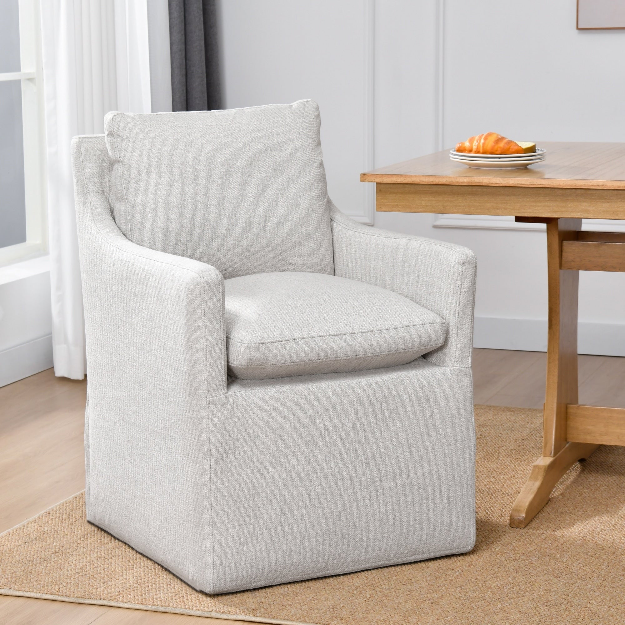 Chaise de salle à manger pivotante et rembourrée en lin