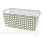 Panier de rangement rectangulaire en plastique blanc avec poignées