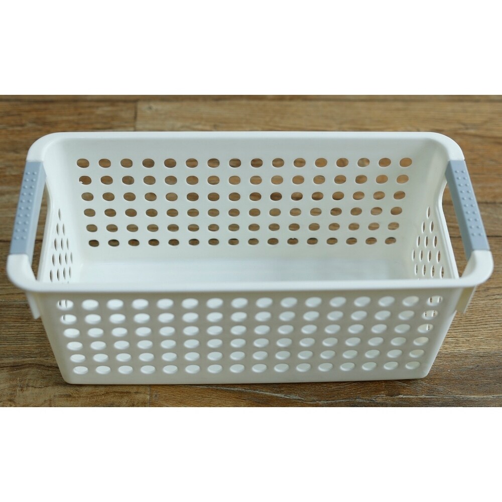 Panier de rangement rectangulaire en plastique blanc avec poignées